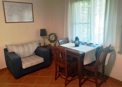 indoor dining area with table and chairs 